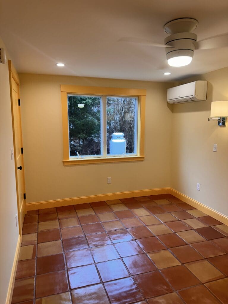Maine custom flooring installation in a guestroom